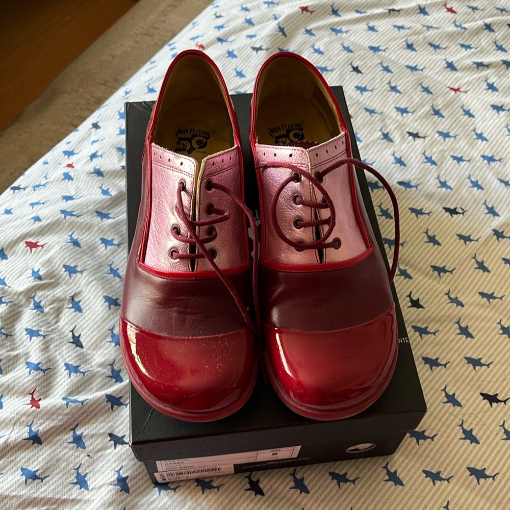 Beautiful condition Fluevog Darby’s with pink foil and red patent.